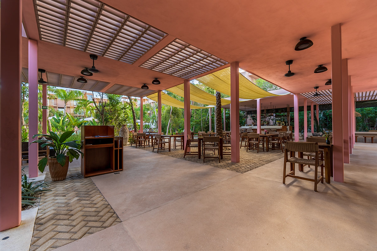 Open-air dining pavilion overlooking tropical planting — Aflora 214